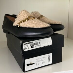 Coach Leather and Sherpa loafers.